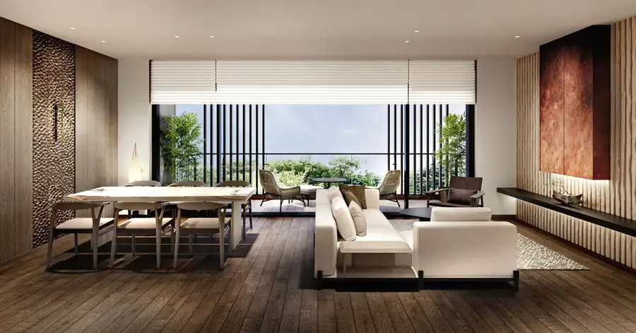 Living and dining room opening onto a balcony