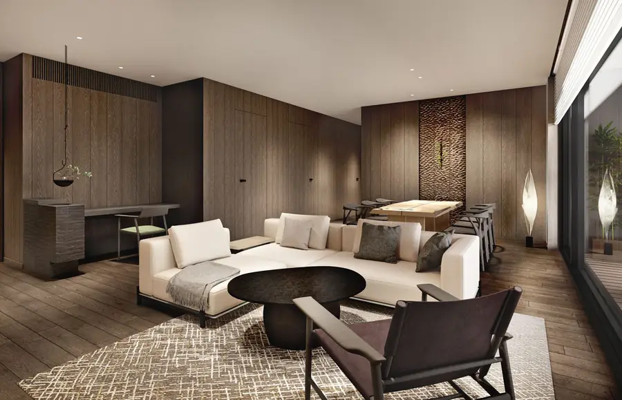 Living and dining room with a large sofa and dining table