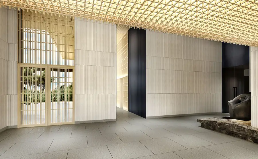 Double-height lobby with a timber ceiling